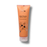 Orange tube of 100% Pure Multi-Vitamin hair conditioner with branding on a white background