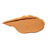 A swatch of 100% Pure 2nd Skin Concealer 5ml in Shade 3, a medium tan tone, sits on a white background, highlighting its natural finish formula.