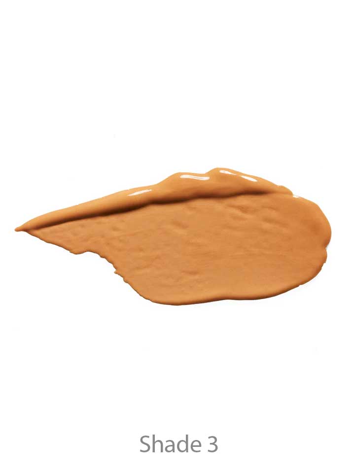 A swatch of 100% Pure 2nd Skin Concealer 5ml in Shade 3, a medium tan tone, sits on a white background, highlighting its natural finish formula.