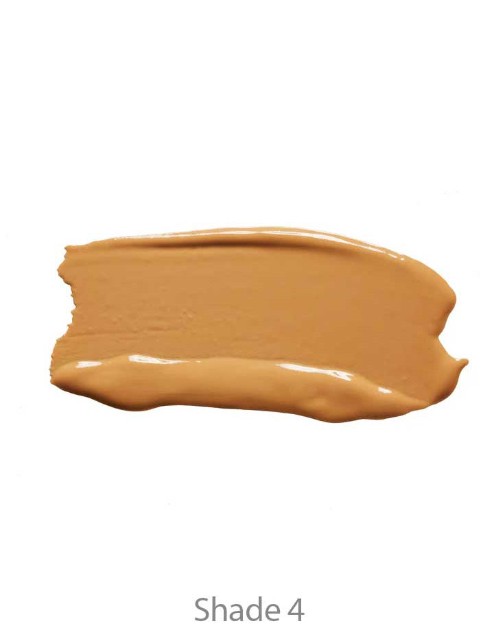 A smooth swatch of medium beige 100% Pure 2nd Skin Concealer 5ml is smeared horizontally on a white background with “Shade 4” below. Achieve flawless coverage and a natural finish with this concealer.