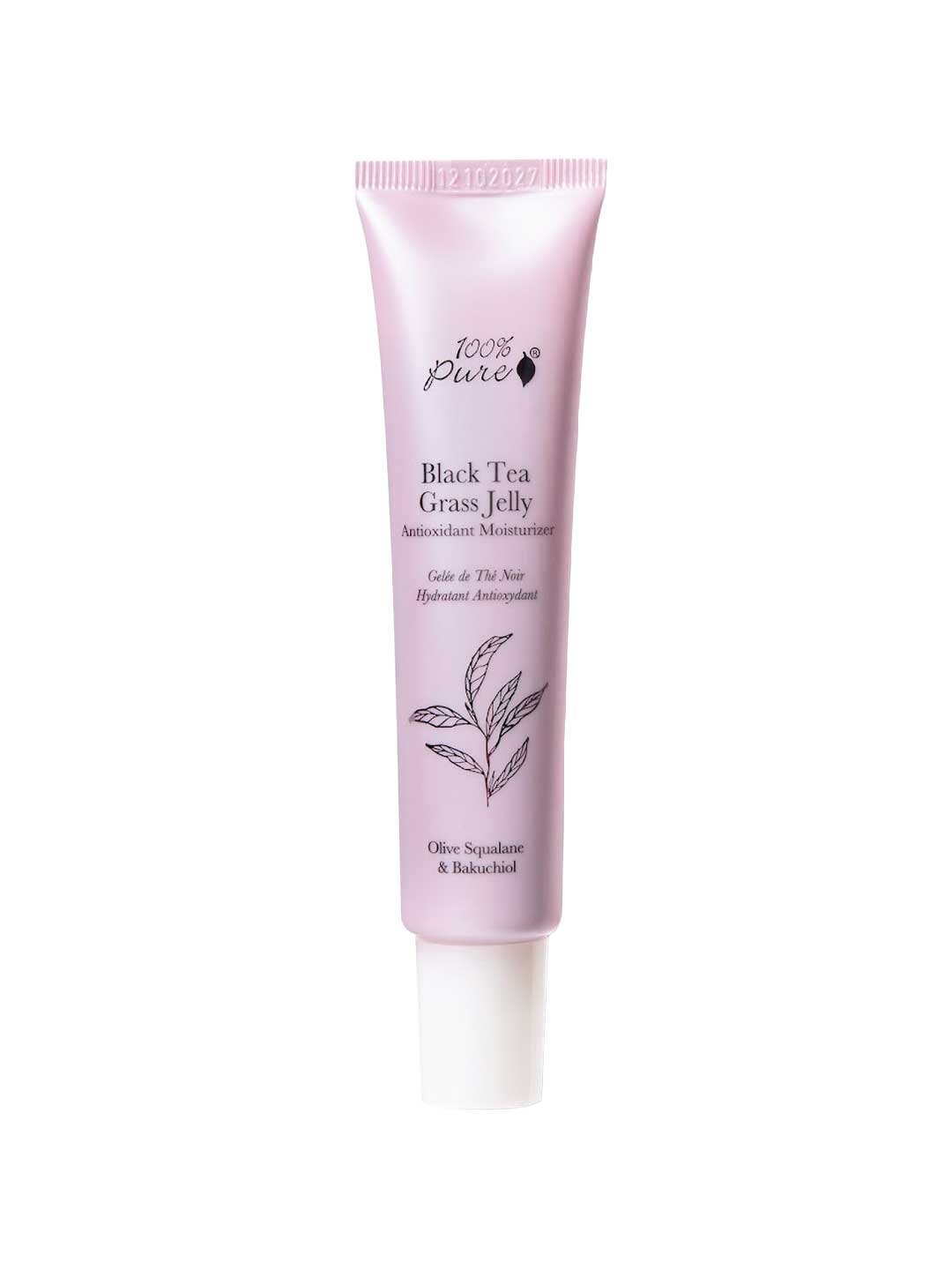 A lavender-pink tube labeled 100% Pure Black Tea Grass Jelly Anti-oxidant Moisturiser 40ml, with a white cap and leaf illustration, stands upright against a white background.