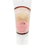 A white squeeze tube of 100% Pure Coconut Buttercream Hand Cream 57g with a pink label features English and French text, plus a coconut shell band near the top, emphasizing deep moisture for your hands.