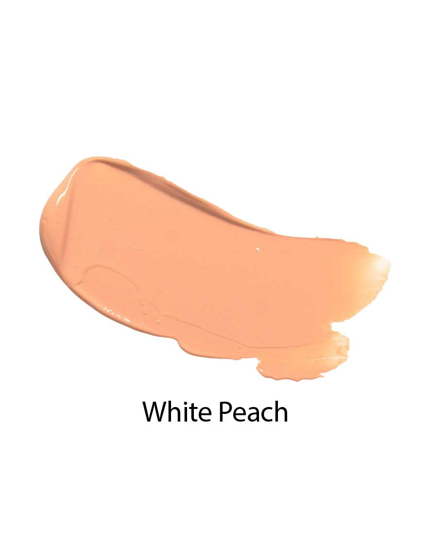 A smear of creamy, light peach-colored 100% Pure Fruit Pigmented® Tinted Moisturiser 30ml in the shade White Peach on a white background.