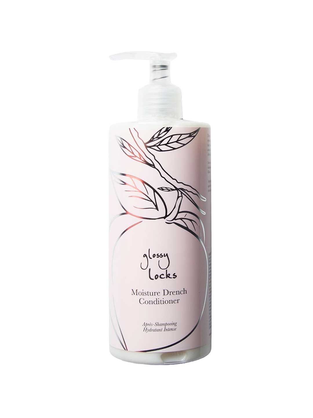 A bottle of 100% Pure Glossy Locks Moisture Drench Conditioner with a pump, made for dry hair, featuring a minimalist leaf pattern and peach outline on a light pink label.
