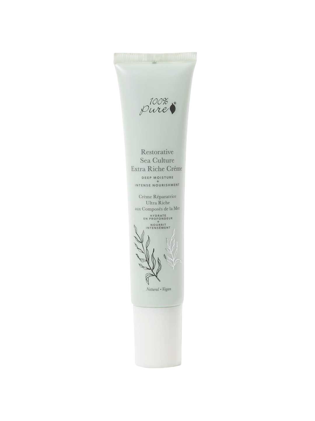 A light green tube of 100% Pure Restorative Sea Culture Extra Riche Créme 40ml, a natural face moisturiser with seaweed polysaccharides, features black text, simple leaf and seaweed illustrations, and a white cap.