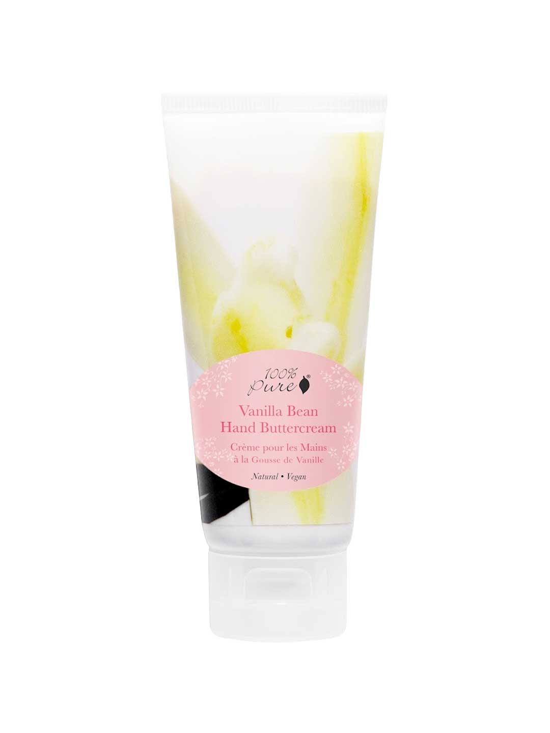 A 57g tube of 100% Pure Vanilla Bean Buttercream Hand Cream with a pink label and white cap features English and French details, emphasizing its deeply moisturizing, natural, and vegan formula.
