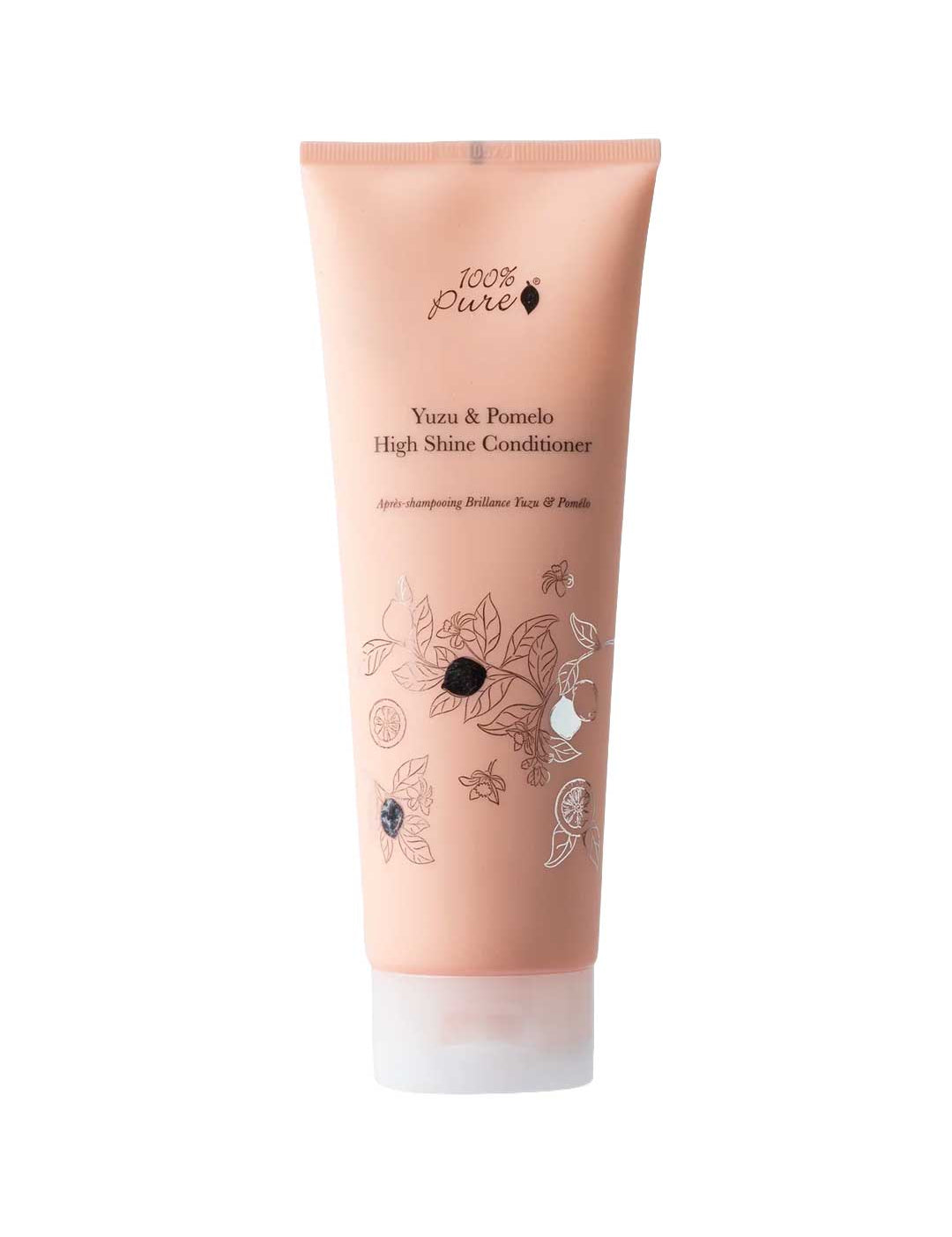 A peach-colored tube of 100% Pure Yuzu & Pomelo High Shine Conditioner, a sulfate-free conditioner featuring black text and botanical illustrations on the front.