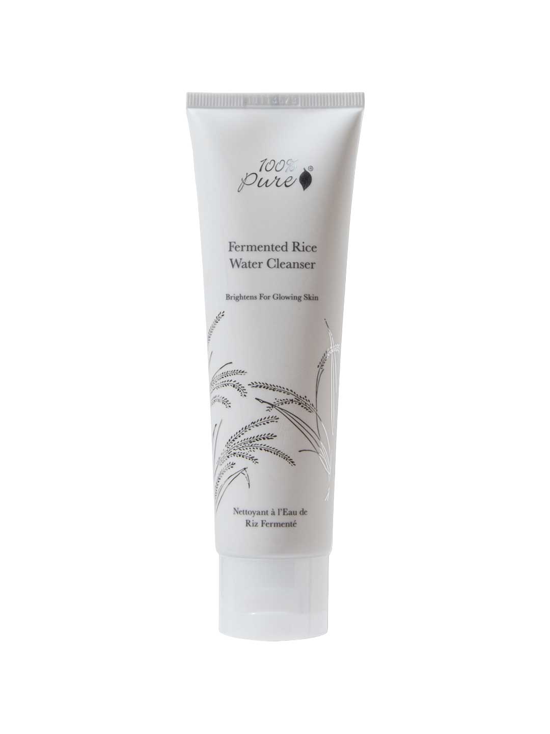 A white tube of 100% Pure Fermented Rice Water Cleanser 100ml, featuring minimalist black text and a rice stalk illustration, stands upright on a white background—ideal for brightening and targeting hyperpigmentation.