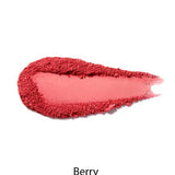 A swipe of 100% Pure Rice Powder Pressed Blush 9g in a berry shade on a white background, with “Berry” beneath it, highlights the natural flush effect.