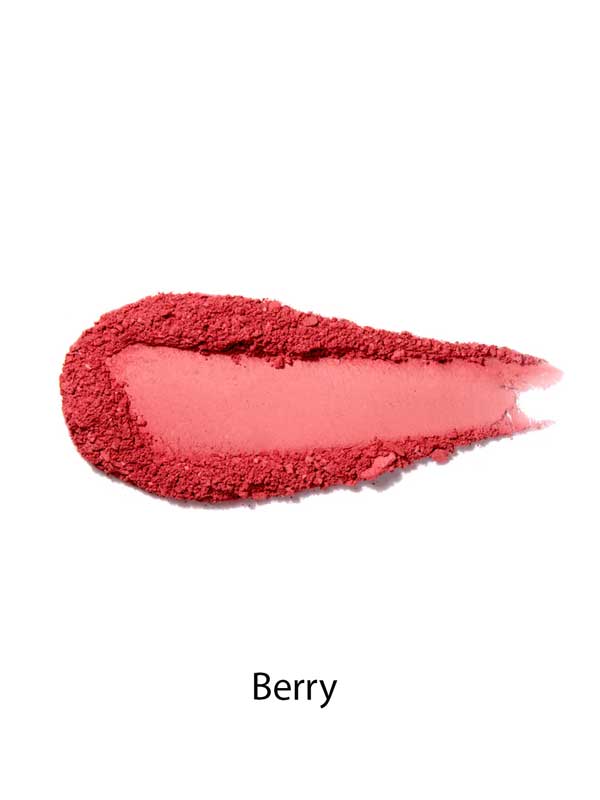 A swipe of 100% Pure Rice Powder Pressed Blush 9g in a berry shade on a white background, with “Berry” beneath it, highlights the natural flush effect.