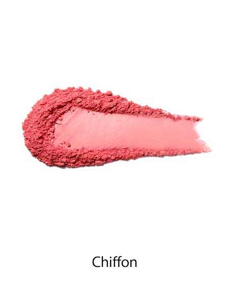 A smear of 100% Pure Rice Powder Pressed Blush 9g in the shade Chiffon is displayed on a white background, offering a natural flush and buildable coverage.