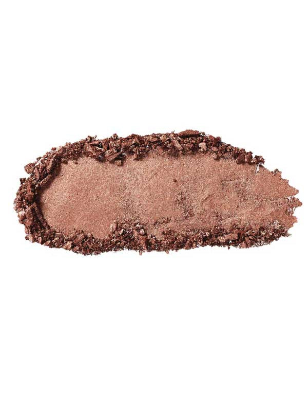 A smudge of shimmery rose gold 100% Pure Pressed Eye Shadow (2g) with a rough, uneven edge, set against a white background.