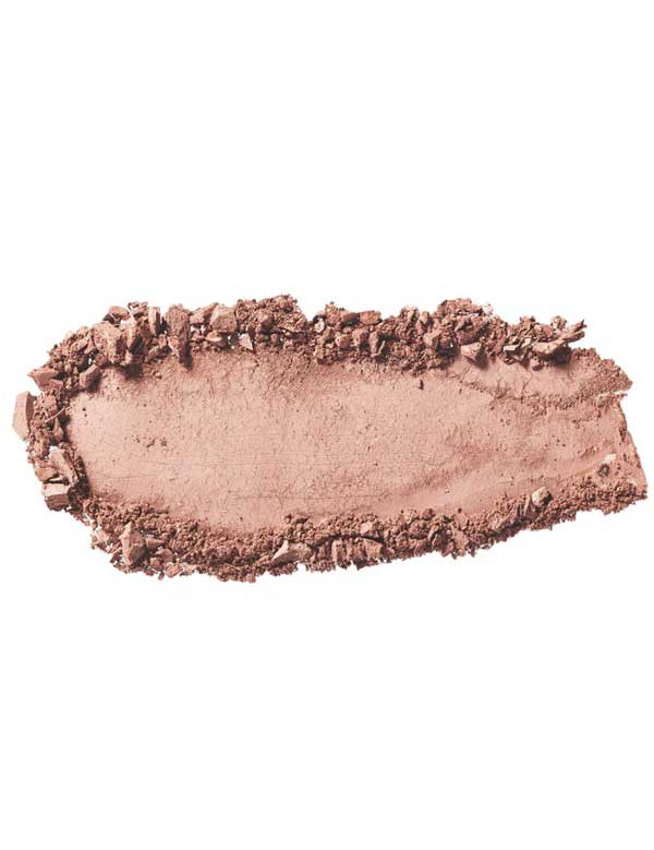 A close-up of 100% Pure Pressed Eye Shadow 2g by 100% Pure in light brown/beige, showing smudged and crumbled vegan powder with mineral shimmer scattered on a white background.