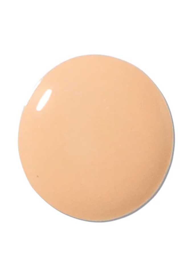 A round, smooth swatch of 100% Pure 2nd Skin Foundation 35ml in light beige provides natural-looking coverage, displayed on a white background.