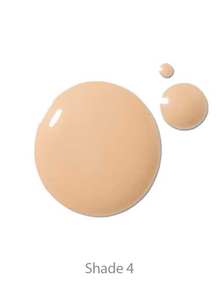 Three drops of 100% Pure 2nd Skin Foundation 35ml in Shade 4 beige rest on a white background. This serum foundation delivers an antioxidant-rich formula for a flawless finish.