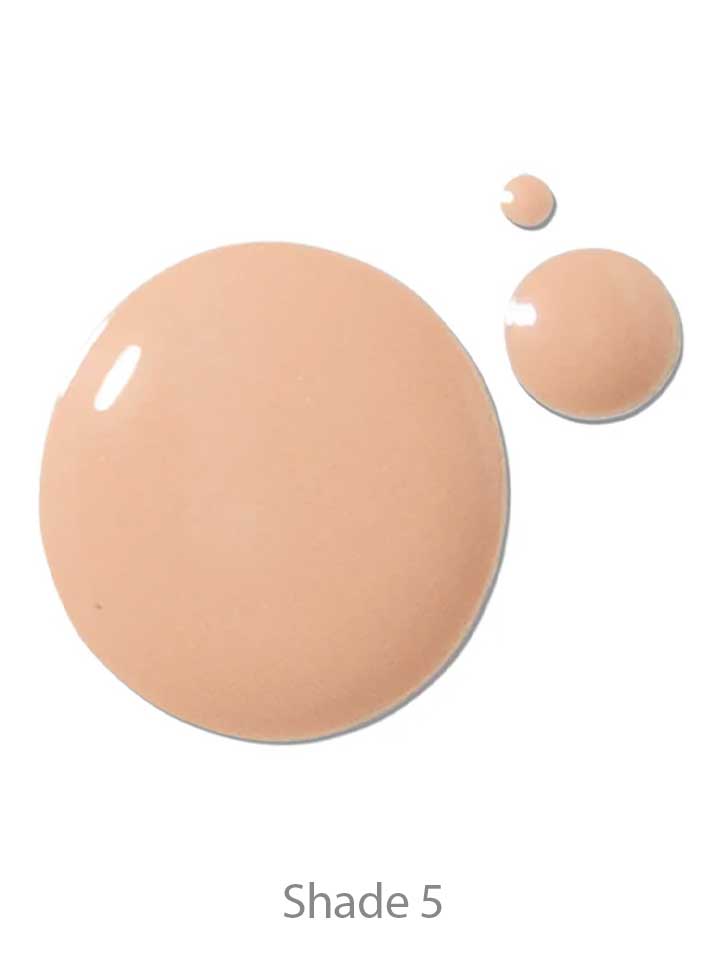 Three drops of 100% Pure 2nd Skin Foundation 35ml in Shade 5 (beige) are displayed on a white background. This serum foundation has an antioxidant-rich formula, delivering a flawless finish.