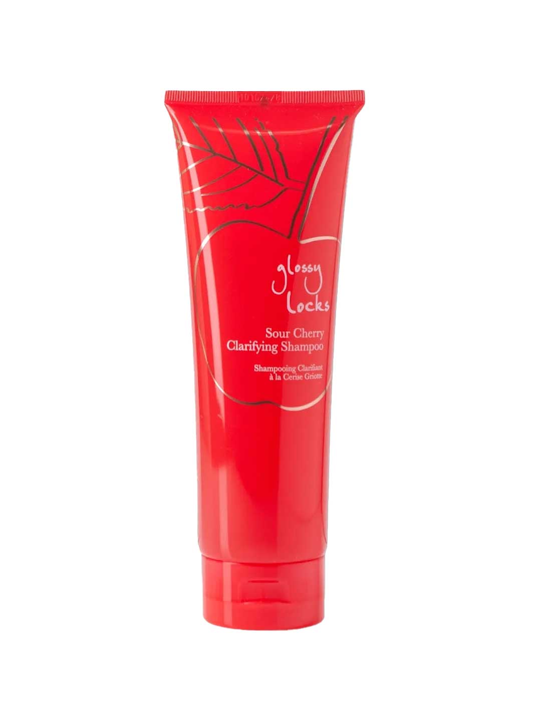 A red tube labeled 100% Pure Glossy Locks Sour Cherry Clarifying Shampoo showcases a simple cherry and leaf design, spotlighting its sulfate-free formula with nourishing sour cherry extract.